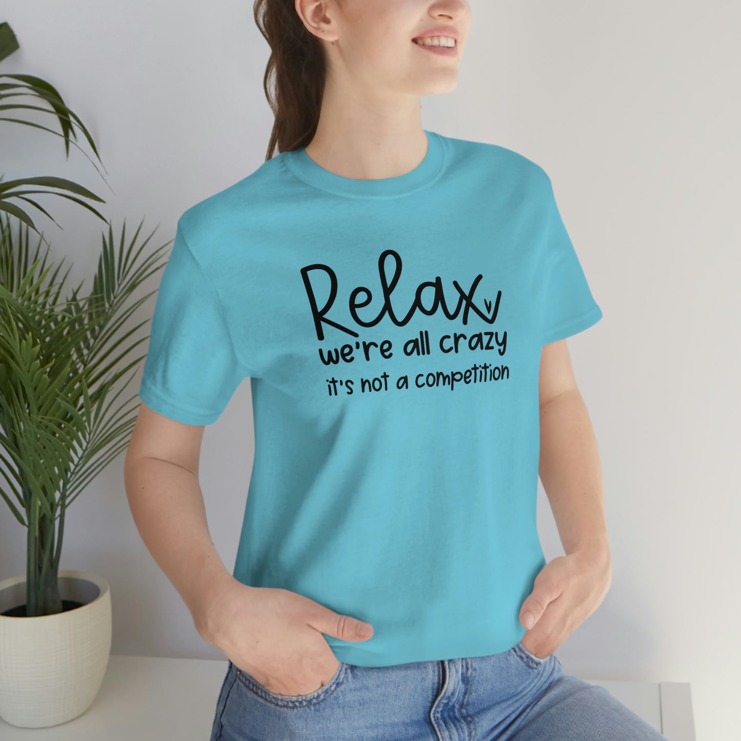 Relax We're all crazy It's not a competition Unisex Jersey Short Sleeve Tee Shirt