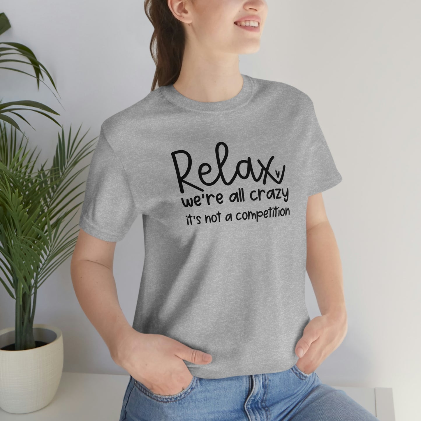 Relax We're all crazy It's not a competition Unisex Jersey Short Sleeve Tee Shirt