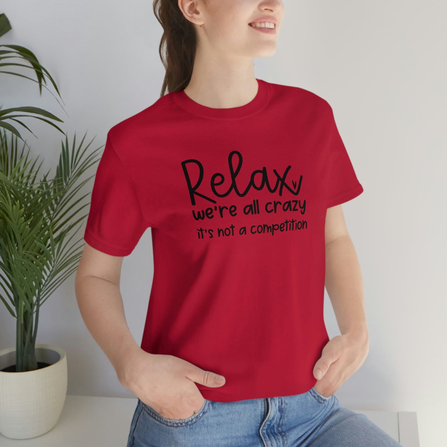 Relax We're all crazy It's not a competition Unisex Jersey Short Sleeve Tee Shirt